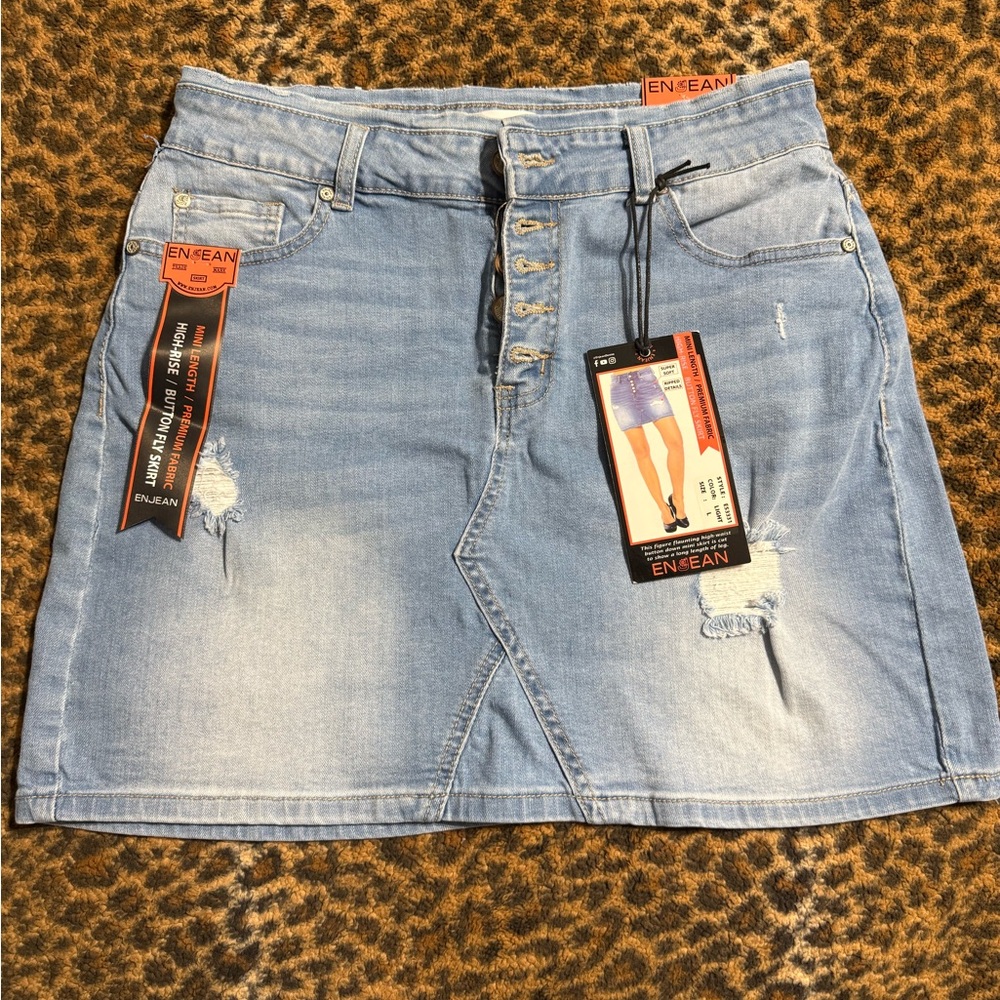 Light Blue Denim Skirt with Distressed Details
